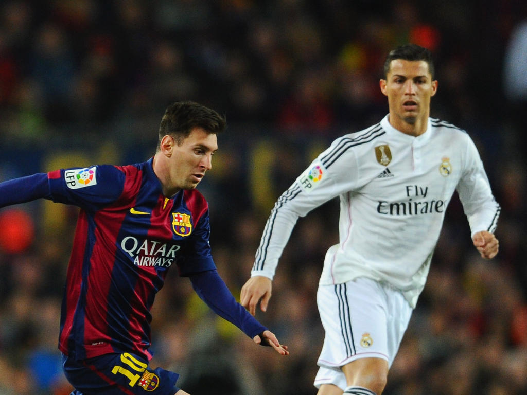 Messi y Ronaldo en una imagen de un duelo liguero. (Foto: Getty)