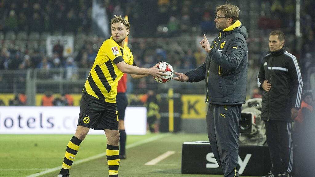 Marcel Schmelzer (l.) könnte in das Trainerteam des BVB aufrücken