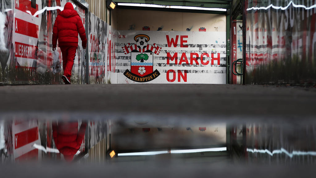 A fan makes their way to the stadium prior to the Premier League match between Southampton FC and West Ham United at St Mary's Stadium on December 14, 2019 in Southampton, United Kingdom.