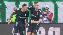 Justin Njinmah (l.) geht in seine dritte Bundesliga-Saison in Bremen