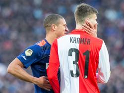 PSV-verdediger Jeffrey Bruma (l.) en Michiel Kramer van Feyenoord (r.) in een vriendelijk onderonsje tijdens de topper tussen Feyenoord en PSV. (17-01-2016)