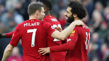James Milner (l.) bleibt dem FC Liverpool treu