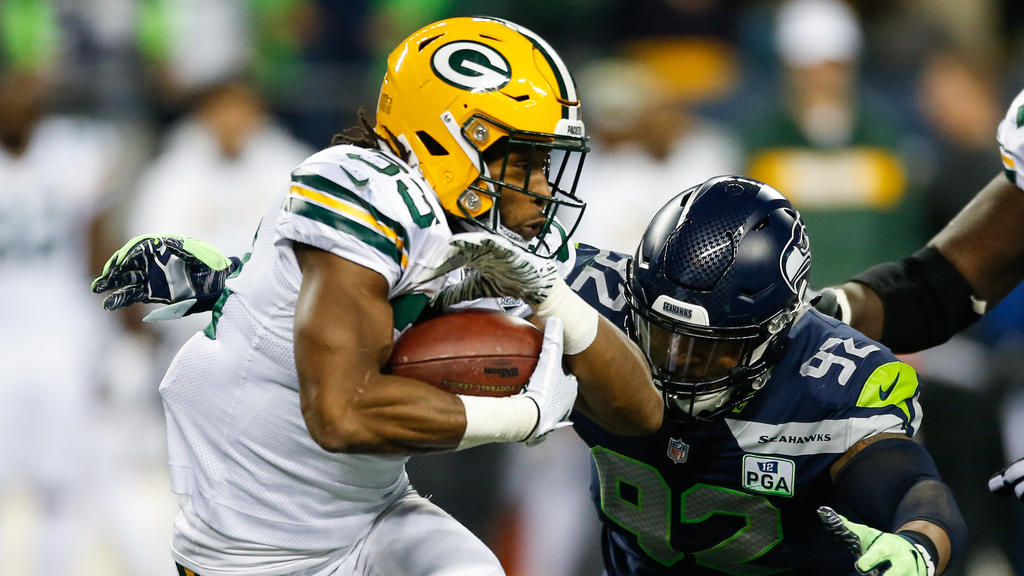 Aaron Jones (l.) und die Green Bay Packers verloren gegen die Seattle Seahawks Aaron Jones (l.) und die Green Bay Packers verloren gegen die Seattle Seahawks