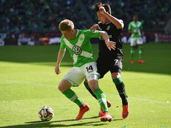 Kevin de Bruyne (l.) könnte in die Premier League wechseln
