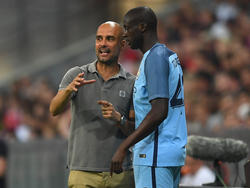 Yaya Touré (r.) und City-Trainer Pep Guardiola