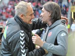 SCF-Coach Christian Streich (l.) unterstützt Martin Schmidt