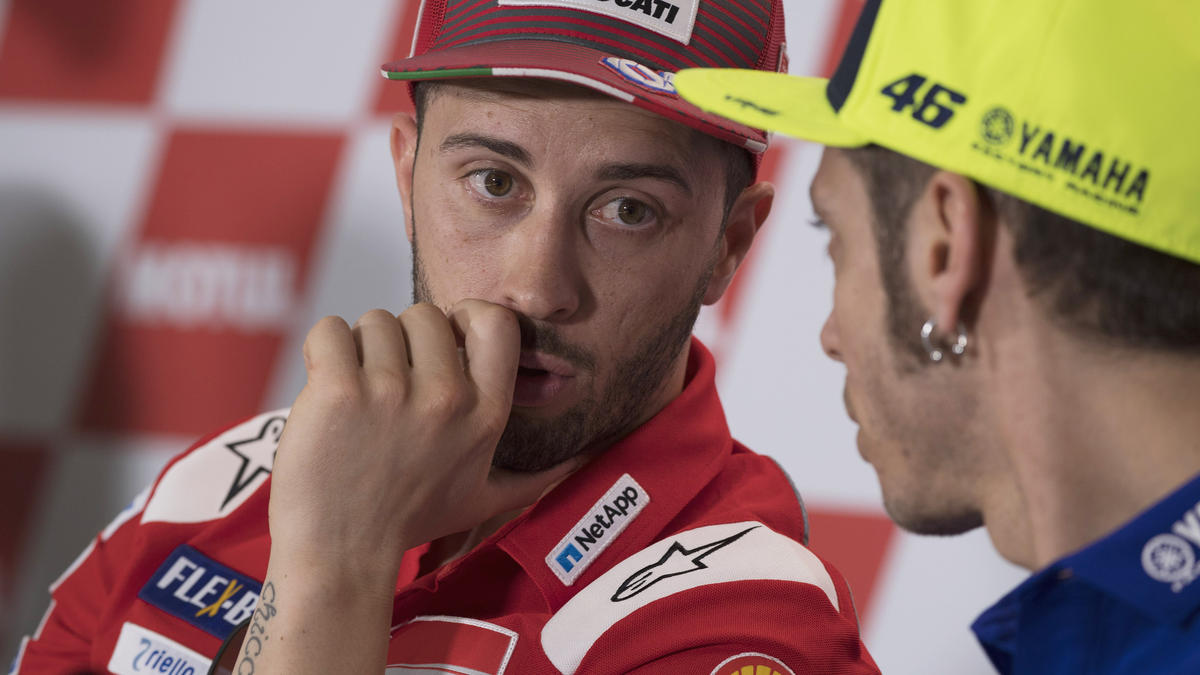 Lieferten sich ein enges Duell um den zweiten Platz: Rossi (re.) und Dovizioso Lieferten sich ein enges Duell um den zweiten Platz: Rossi (re.) und Dovizioso