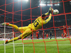 Oblak parando el penalti de Müller en la semifinal de la Champions. (Foto: Getty)