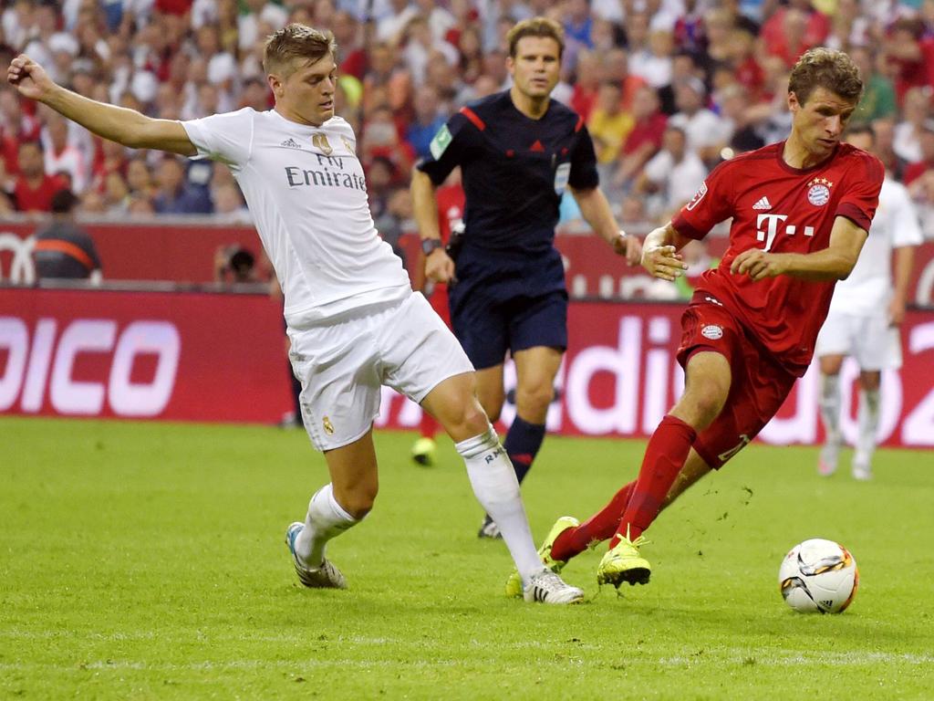 Toni Kroos (l.) will mit Real Madrid gegen Bayern gewinnen