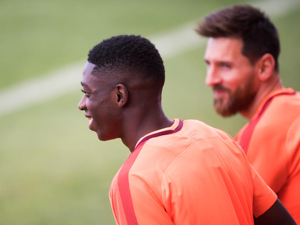 Ousmane Dembélé (l.) freut sich auf seine Rückkehr beim FC Barcelona