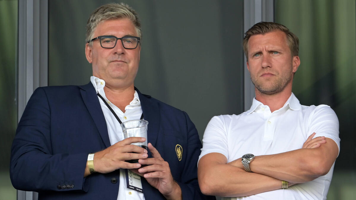 Axel Hellmann (l.) und Markus Krösche arbeiten seit Jahren vertrauensvoll zusammen