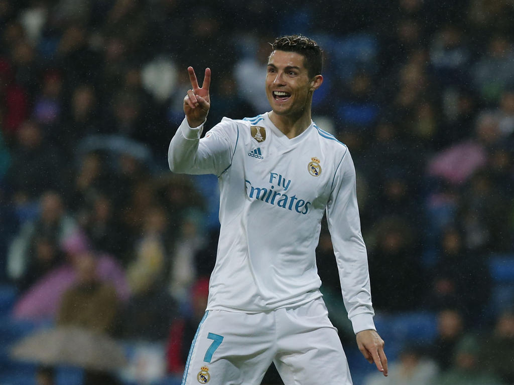 Ronaldo celebra su doblete bajo la lluvia de Madrid. (Foto: Getty)