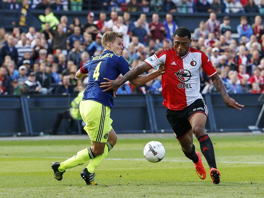 Colin Kâzim-Richards (r.) ontdoet zich vrij gemakkelijk van Niklas Moisander (l.) tijdens Feyenoord - Ajax. (21-09-2014) Colin Kâzim-Richards (r.) ontdoet zich vrij gemakkelijk van Niklas Moisander (l.) tijdens Feyenoord - Ajax. (21-09-2014)