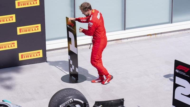 Sebastian Vettel vertauschte in Kanada im Parc Fermé die Nummerntafeln Sebastian Vettel vertauschte in Kanada im Parc Fermé die Nummerntafeln