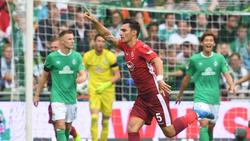 Hat seinen Vertrag mit Fortuna Düsseldorf vorzeitig verlängert: Kaan Ayhan (M.) jubelt über einen Treffer. Foto: Carmen Jaspersen