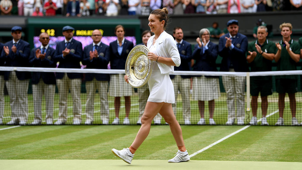 Simon Halep sicherte sich ihren ersten Wimbledon-Sieg Simon Halep sicherte sich ihren ersten Wimbledon-Sieg