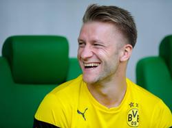 Jakub Błaszczykowski lacht tijdens een oefenwedstrijd van Borussia Dortmund tegen Slask Wroclaw uit Polen. (6-8-2014)