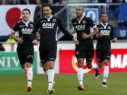 V.l.n.r: Celso Ortíz, Steven Berghuis, Simon Poulsen en Dabney Dos Santos vieren de openingstreffer tijdens sc Heerenveen - AZ. (11-04-2015)