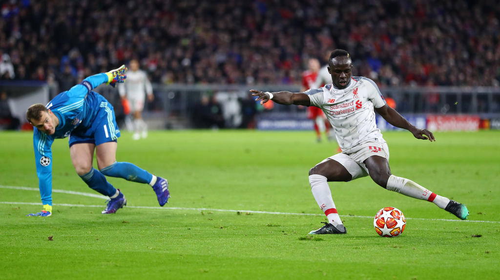 Die Szene zum 1:0 für Liverpool: Sadio Mané düpiert Manuel Neuer