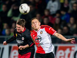Jens Toornstra (r.) en Bas Kuipers (l.) vechten een luchtduel uit tijdens Excelsior - Feyenoord. (06-12-2014)