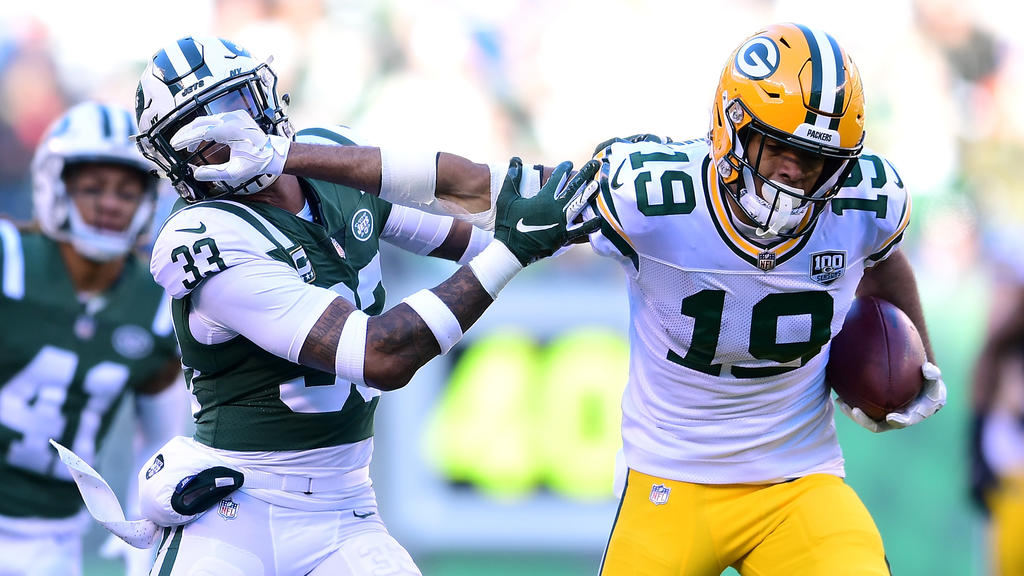 Equanimeous St. Brown (r.) jagt seinen ersten Touchdown in der NFL Equanimeous St. Brown (r.) jagt seinen ersten Touchdown in der NFL