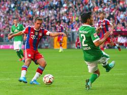 Philipp Lahm (l.) kann sich durchaus vorstellen, länger als 2018 zu spielen