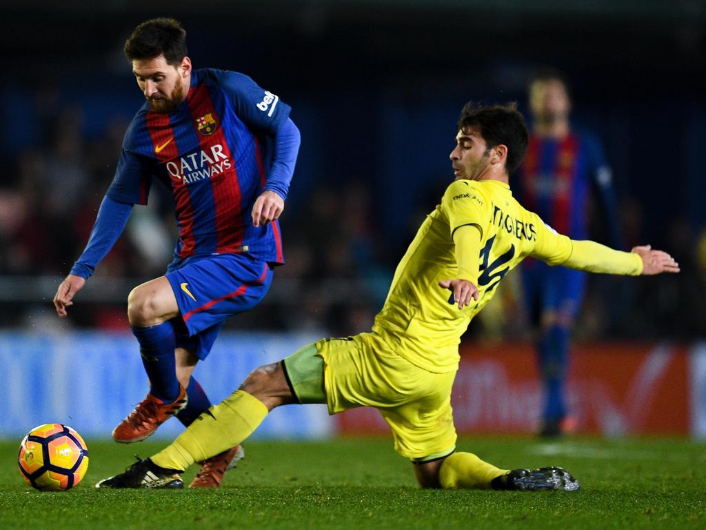 Lionel Messi (l.) konnte dem FC Barcelona einen Punkt gegen Villarreal retten