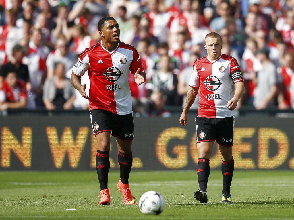 Colin Kâzim-Richards (l.) en Jordy Clasie (r.) balen tijdens Feyenoord - Ajax. (21-09-2014)
