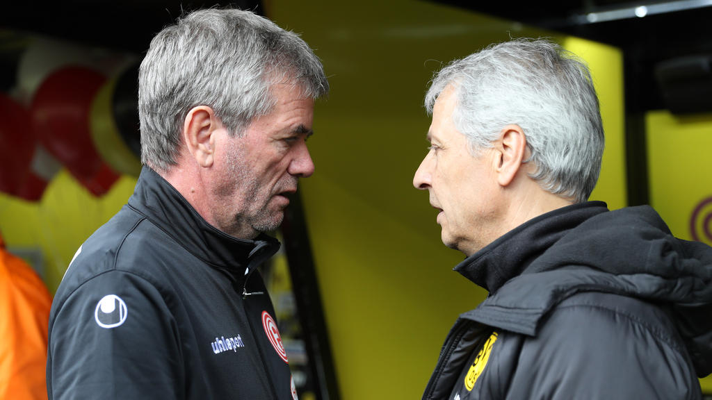 Friedhelm Funkel (l.) hat BVB-Coach Lucien Favre gegen Kritik in Schutz genommen Friedhelm Funkel (l.) hat BVB-Coach Lucien Favre gegen Kritik in Schutz genommen
