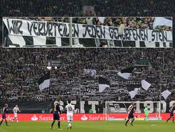 Die Borussia-Fans ließen sich zu einem beleidigenden Banner hinreißen; Fotomontage