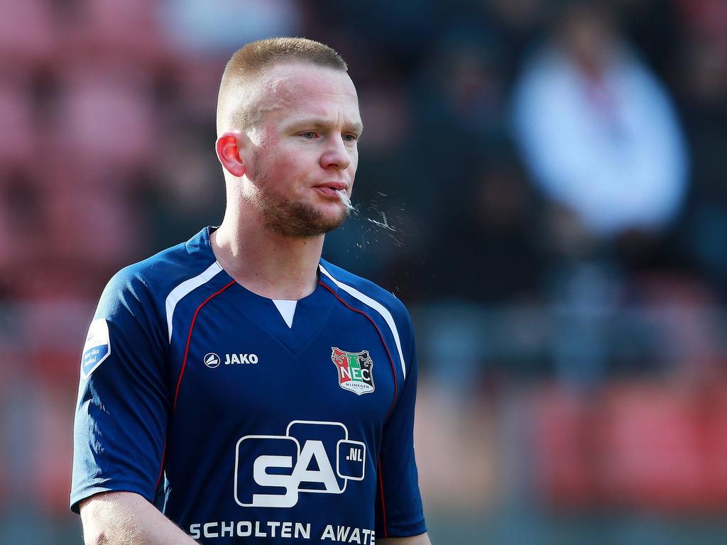 Melvin Platje van NEC Nijmegen spuugt zijn gal in het duel met FC Utrecht. (10-02-2013)