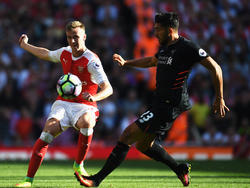 Jürgen Klopp kann wieder auf Emre Can (r.) setzen