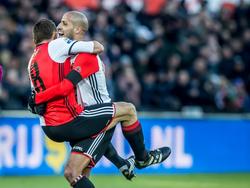 Jens Toornstra (l.) springt na zijn treffer voor Feyenoord tegen Sparta teamgenoot Karim El Ahmadi in de armen. (04-12-2016)