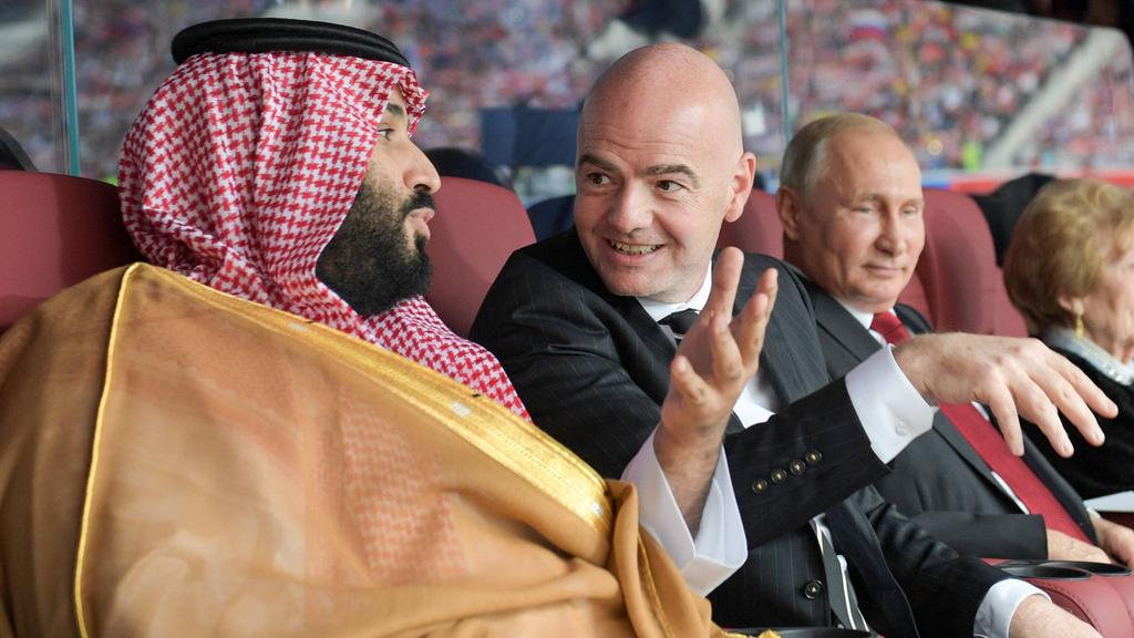 JUNE 14, 2018: Saudi Arabia s Crown Prince Mohammed Bin Salman Al Saud, FIFA President Gianni Infantino, and Russia s President Vladimir Putin (L-R) at the opening ceremony of the 2018 FIFA World Cup atLuzhniki Stadium.