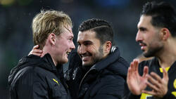 Julian Brandt (l.) stärkt BVB-Trainer Nuri Sahin