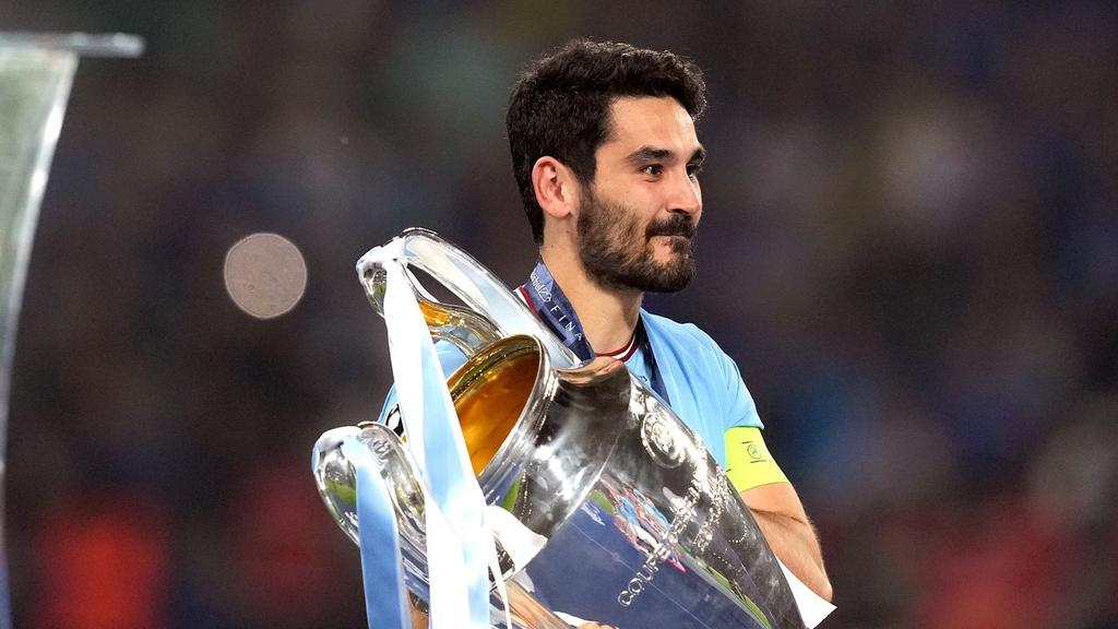 Nimmt den Champions-League-Pott mit nach England: Ilkay Gündogan Nimmt den Champions-League-Pott mit nach England: Ilkay Gündogan