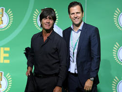 Oliver Bierhoff (re.) will weiter beim DFB bleiben