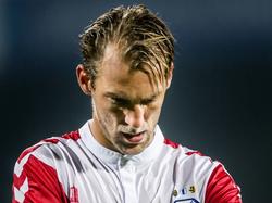 Willem Janssen kijkt teleurgesteld naar de grond na de competitiewedstrijd Excelsior - FC Utrecht. De ploeg van aanvoerder Janssen gaat met 1-0 onderuit in Rotterdam. (03-10-2015)