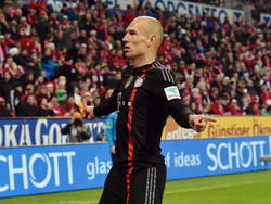 Arjen Robben viert zijn winnende doelpunt tijdens FSV Mainz 05 - Bayern München. (19-12-2014). 