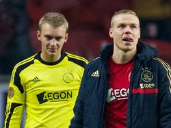 Jasper Cillessen en Kolbeinn Sigþórsson lopen een ereronde in de ArenA na het topduel met PSV, dat in 1-0 eindigde. (19-01-2014)