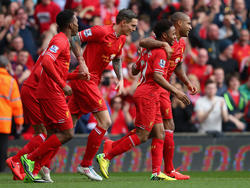 Die Spieler des FC Liverpool feiern ihren deutlichen Sieg gegen Tottenham