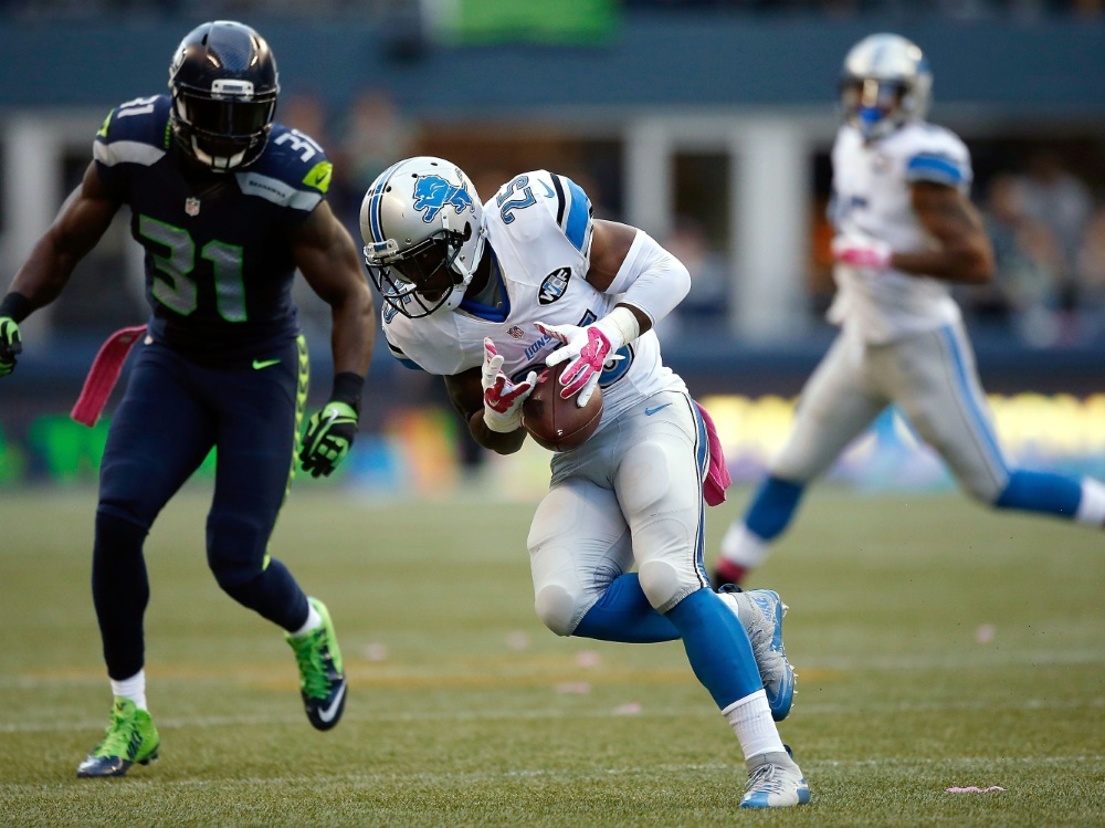 Kam Chancellor (l.) rettet seinem Team den Sieg Kam Chancellor (l.) rettet seinem Team den Sieg