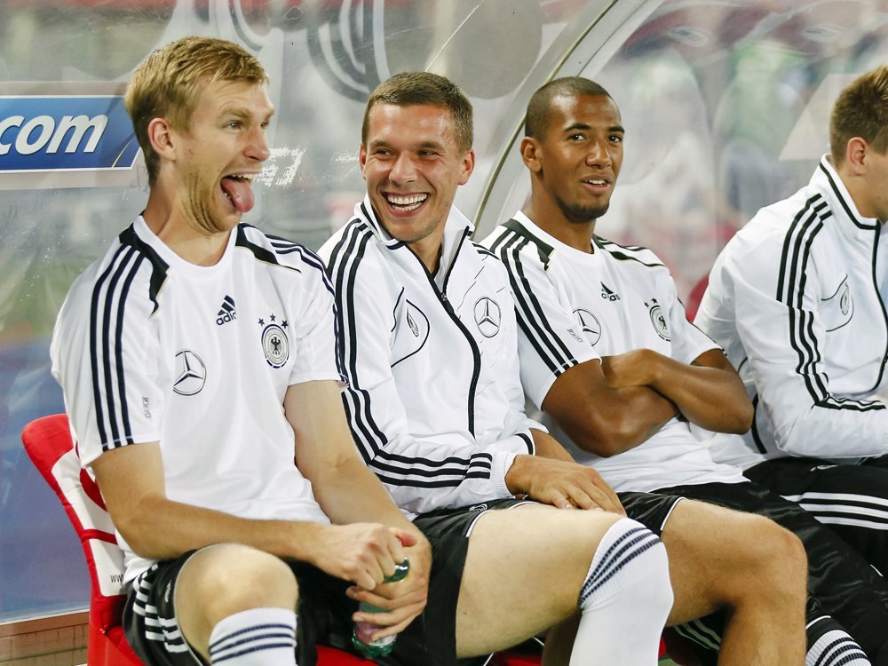 Per Mertesacker und Lukas Podolski Per Mertesacker und Lukas Podolski