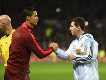 Cristiano Ronaldo (l.) und Lionel Messi