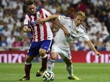 Luka Modric (r.) verlängert bei Real Madrid bis 2018