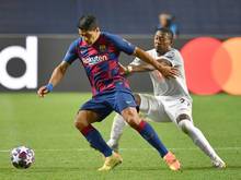 Suárez (l.) muss sich wohl einen neuen Verein suchen