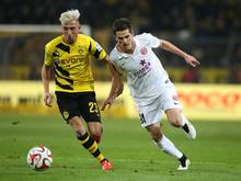 Jonas Hofmann (r.) soll zum BVB zurückkehren