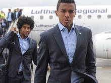 Dante (l.) und Luiz Gustavo mit Brasilien in Asien